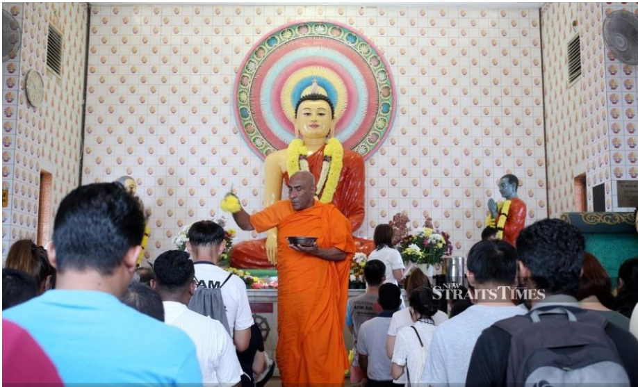 Devotees, visitors and tourists converged at the 125-year-old Maha Vihara Buddhist Temple in Brickfields today to celebrate Wesak Day. (NSTP/ ZULFADHLI ZULKIFLI)